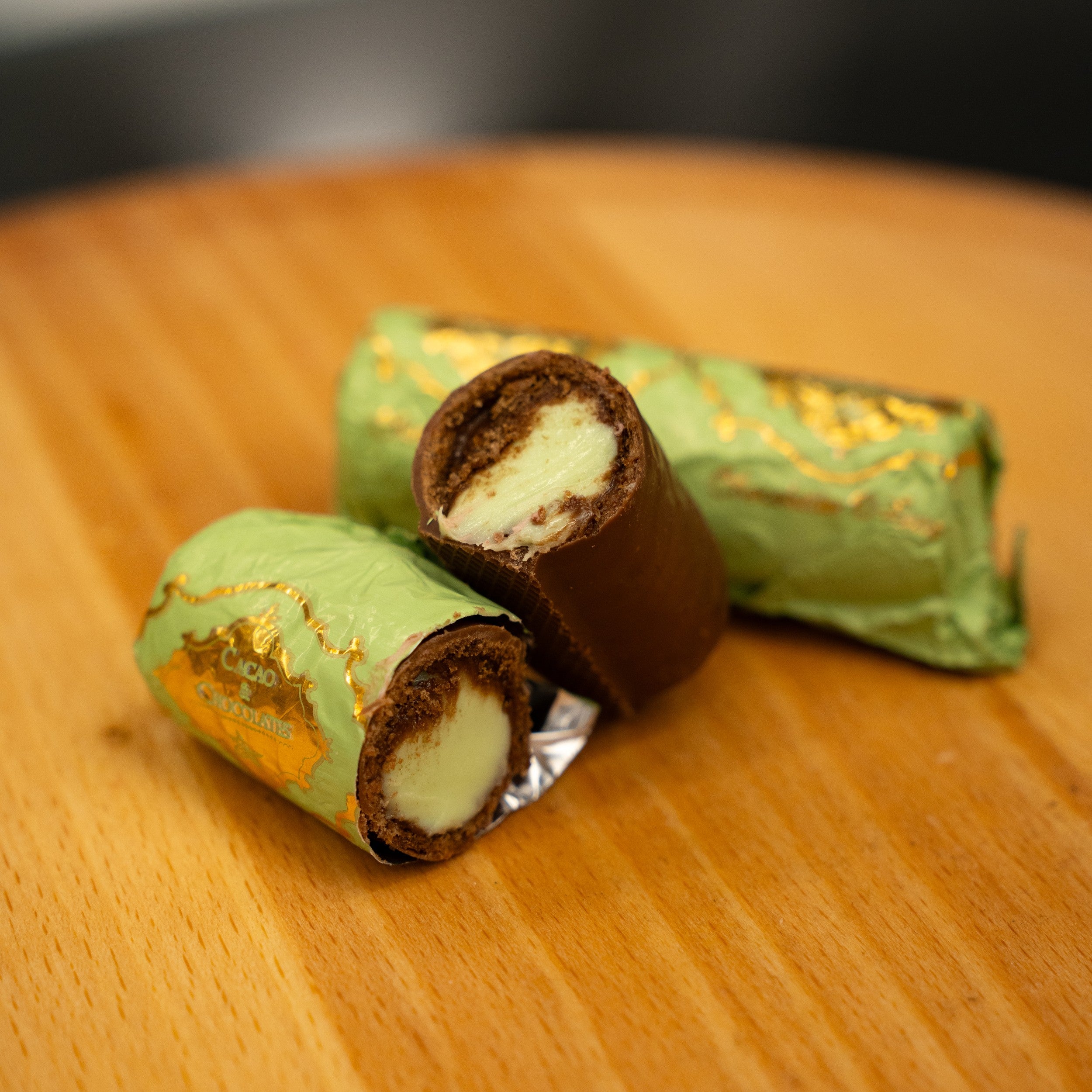 Pistachio rolls in chocolate